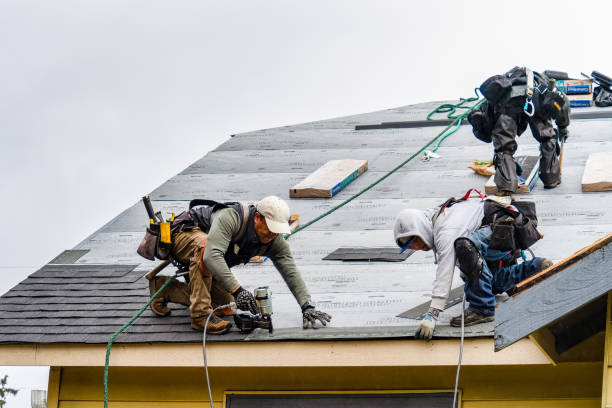 Professional Gutter Installation technician working in Sag Harbor, NY